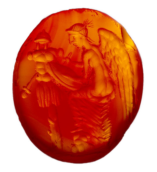 Amber coloured carved gemstone from a ring setting found at Lullingstone Roman Villa, depicting winged victory with armour and weapons Amber coloured carved gemstone from a ring setting found at Lullingstone Roman Villa, depicting winged victory with armour and weapons
