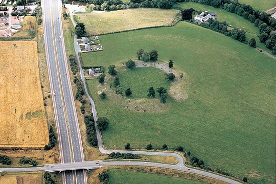 Aerial view of Mayburgh Henge with M6 road passing by to the south west Aerial view of Mayburgh Henge with M6 road passing by to the south west