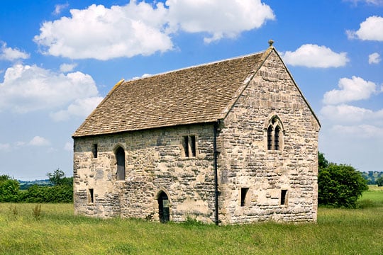 Photograph showing Meare Fish House from the south-east in a grassy pasture field Photograph showing Meare Fish House from the south-east in a grassy pasture field