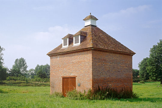 Elegant and yet functional, the dovecote is brick built to a square plan with cupola