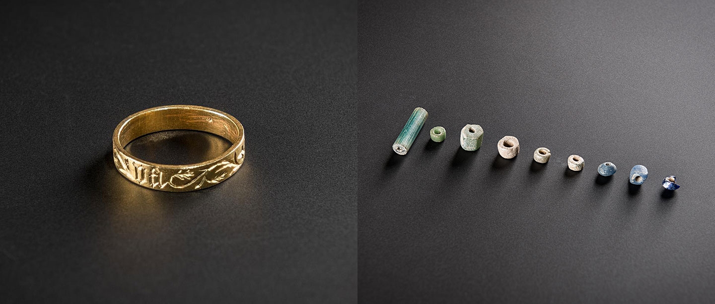 A medieval gold ring (left) and late Roman glass beads (right), excavated at Pevensey Castle, East Sussex