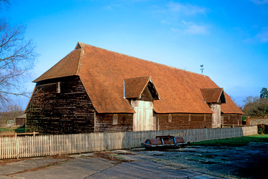 A view of the porches of the 15th century Priors Hall Barn