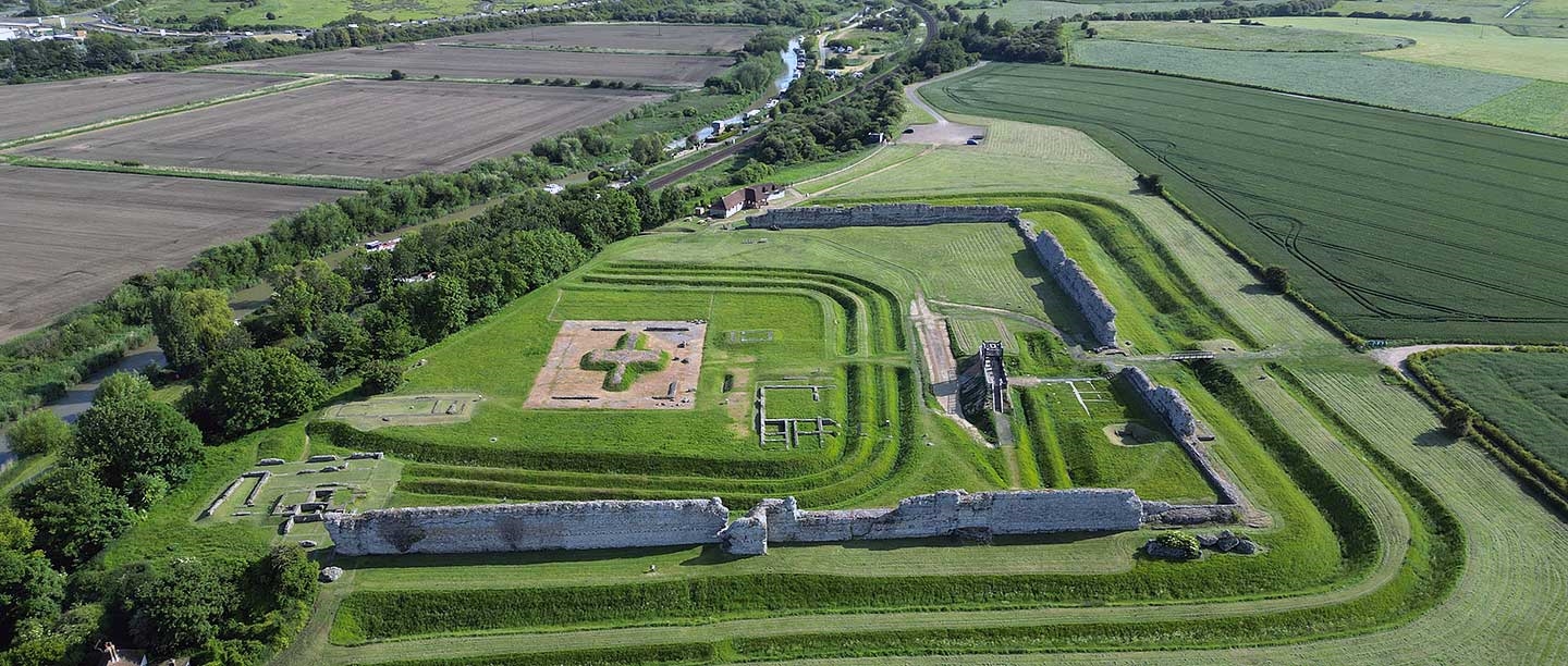 The walls and ditches of Richborough Roman fort seen from the air