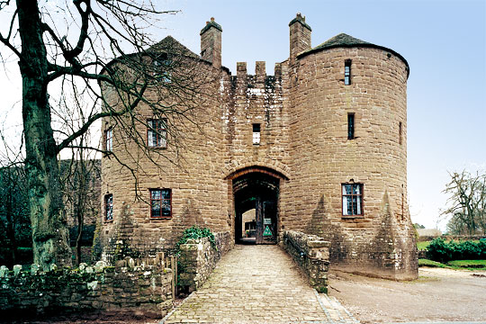 The impressive double towers of the gatehouse with conical tiled roofs