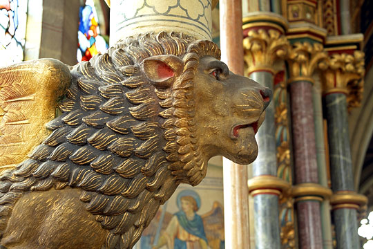 The majestic winged Lion of Judah gilded carving on the south side of the chancel, St Marys, Studley Royal