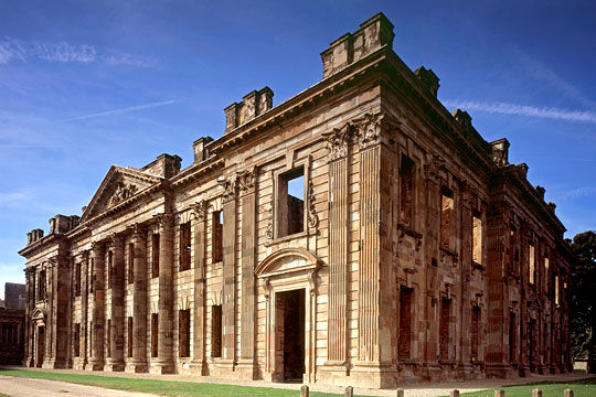 The eastern front of Sutton Scarsdale Hall, with substantially intact walls but roofless The eastern front of Sutton Scarsdale Hall, with substantially intact walls but roofless