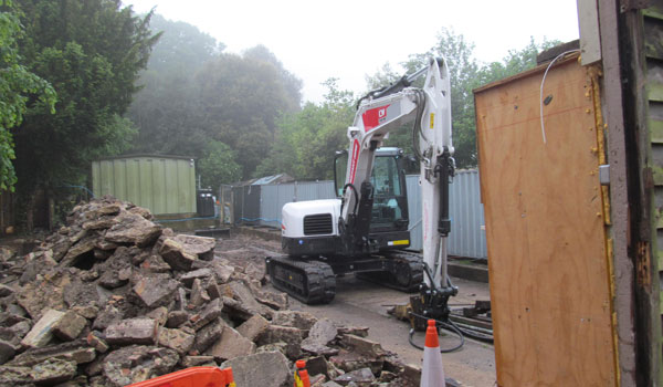 A digger parked at the construction site