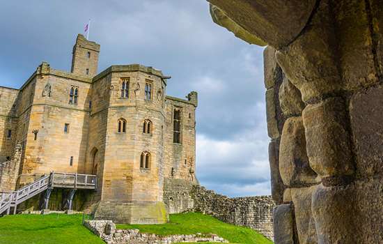 Image: Warkworth castle as seen through and archway Image: Warkworth castle as seen through and archway