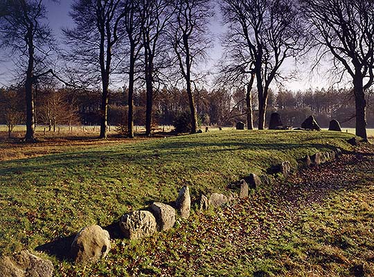 Part of the kerb of sarsen slabs surrounding the mound at Wayland’s Smithy