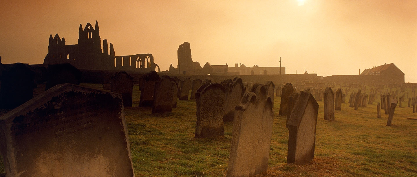Yorkshire Ghost Tours: 5 Haunted Highways Where the Stories Beat the Scares Whitby Abbey above the churchyard, one of Yorkshire’s most atmospheric historic places