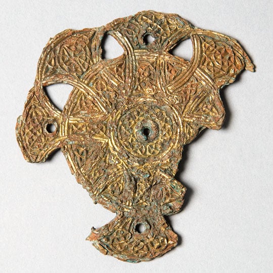 A fragmentary Anglican decorative mount or clasp for a book cover, recovered in excavations at Whitby near Whitby Abbey