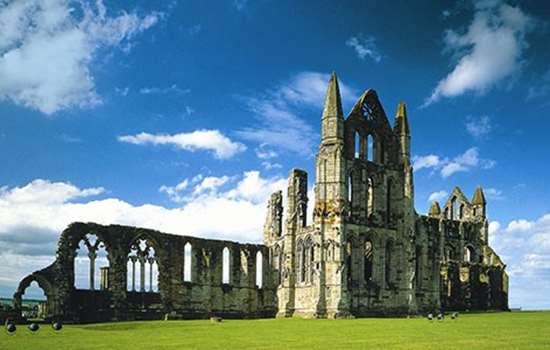 York to Whitby the Scenic Way: A Sightseeing Transfer with Moors and Coast on the Way Gothic stone arches at Whitby Abbey