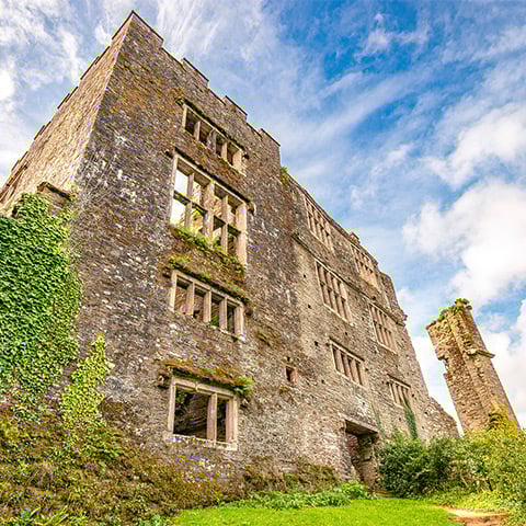 A ruined castle with large windows