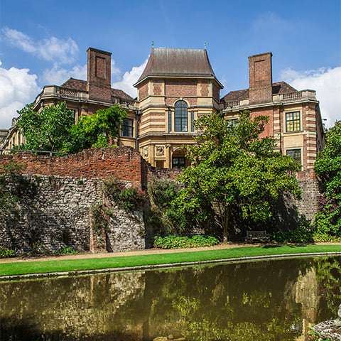 A grand palace overlooking a river