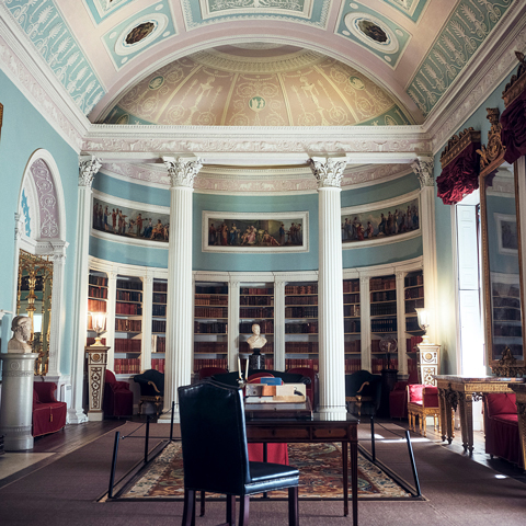 The Adam library in Kenwood, with view of the domed ceiling featuring classical white columns. 