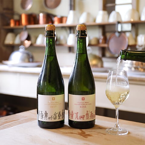 Image: two bottles of English Heritage branded wine (Brut and Rosé)