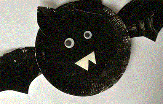 A crafted handmade bat made out of a paper plate painted black. A crafted handmade bat made out of a paper plate painted black.