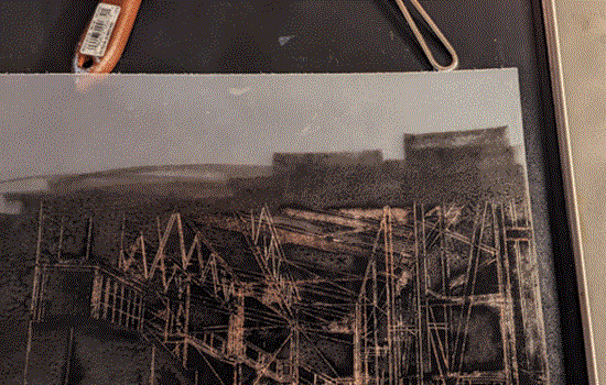 An abstract architectural drawing on a desk. An abstract architectural drawing on a desk.