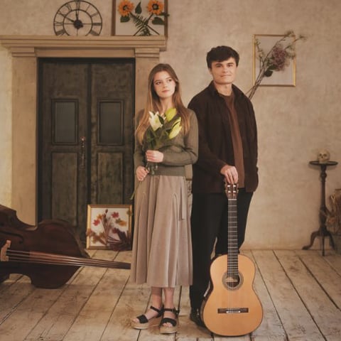 A photograph of performers, Eleanor Grant and Gus McQuade.