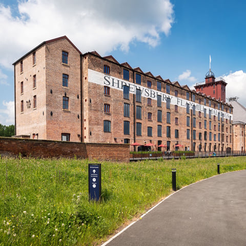 A view of Shrewsbury Flaxmill Maltings on a sunny day.