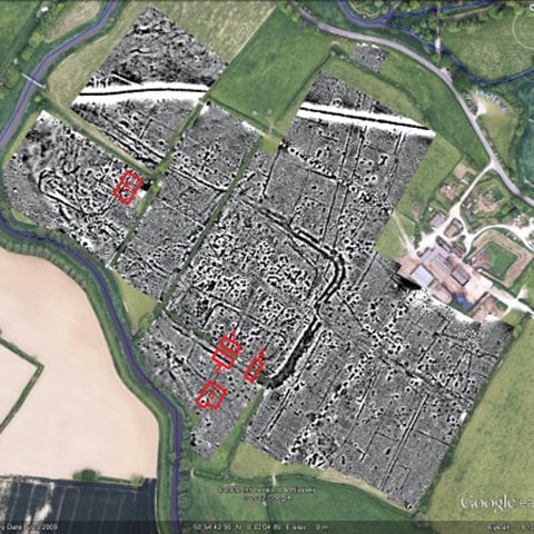 An aerial image diagram showing the ground of Pevensey Castle surrounded by fields.